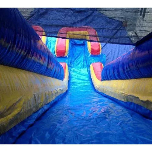 20-foot high inflatable double slide with pool and drying area