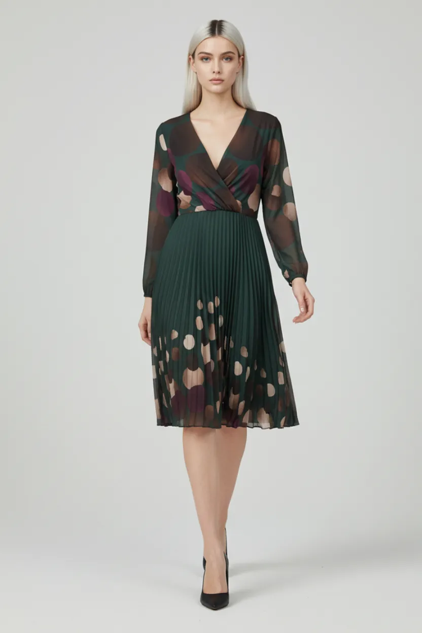 Green pleated midi dress with spotted print