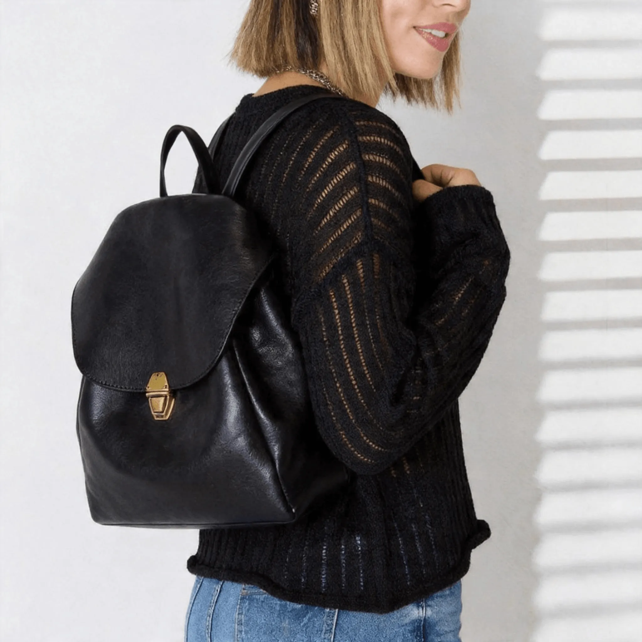 Gold Clasp Top Grain Black Leather Backpack