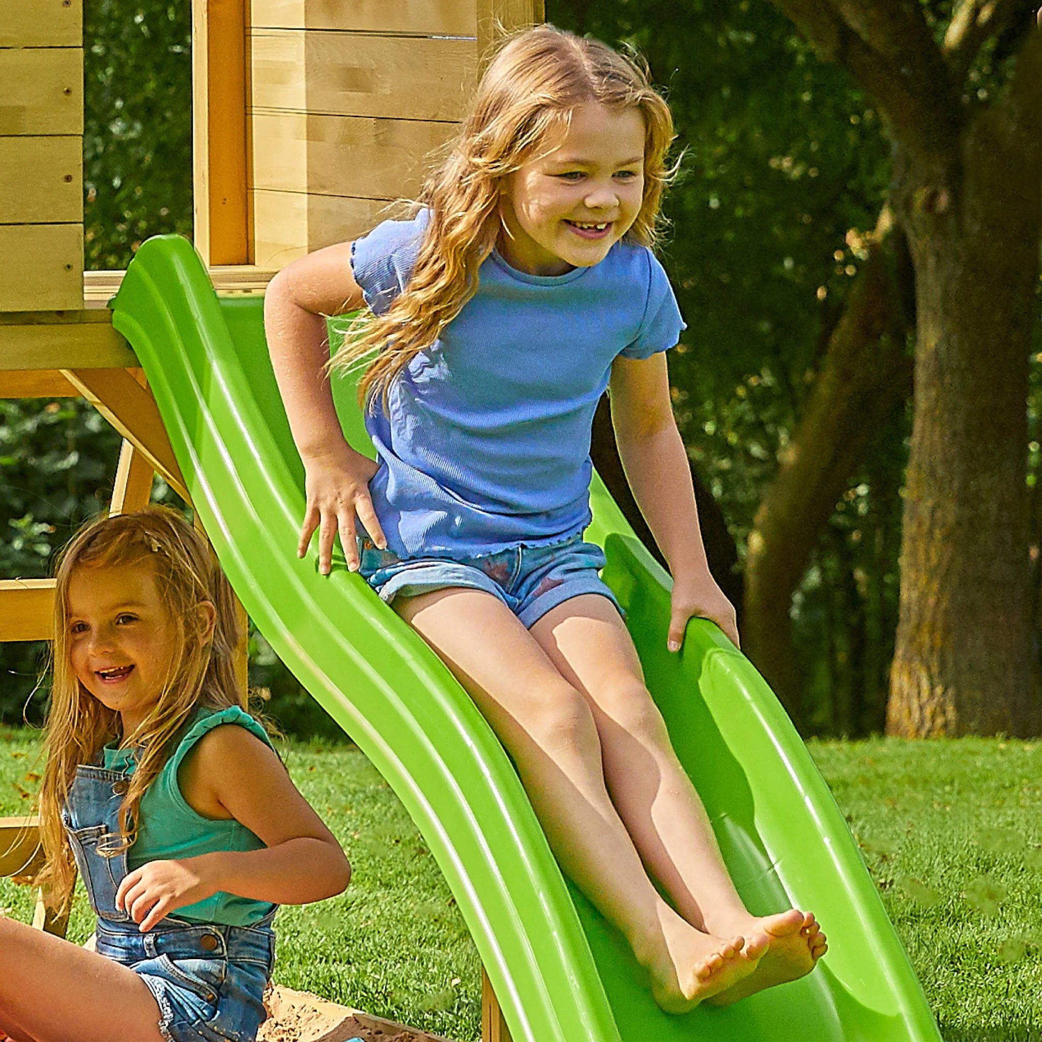 TP Treehouse Houten Speeltoren met Golvenglijbaan �C FSC? gecertificeerd