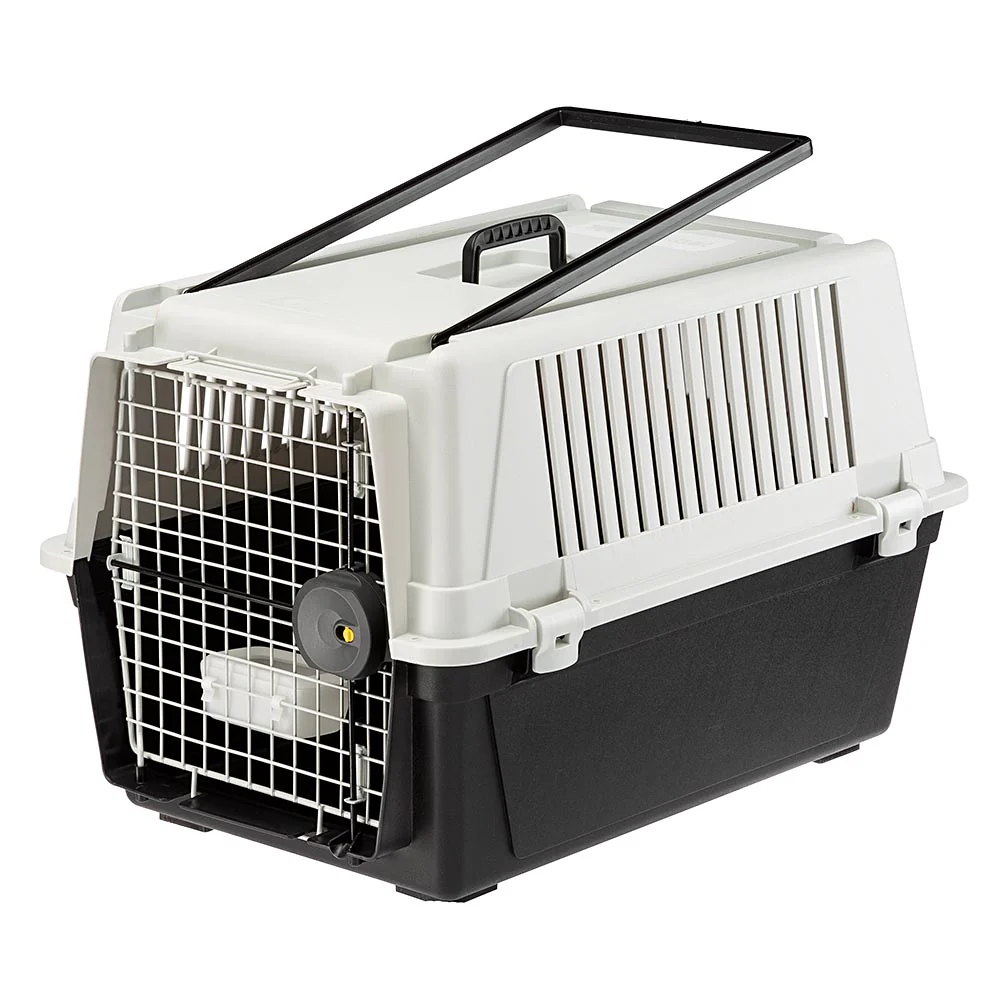 2025 Atlas 40 transportbox voor middelgrote honden �C veilig, geventileerd en IATA-conform. Met praktische handgreep, voederbak en optionele accessoires