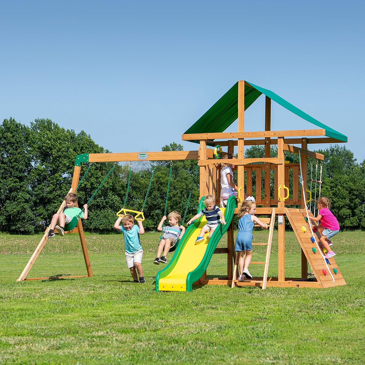 Backyard Discovery Mount Mckinley Cedar Wood Swing Set with Wave Slide. Play Deck. Double Rock Wall. Rope Ladder. Web Swing. Belt Swings. Toy Telescope. Steering Wheel. Sandbox Area. Outdoor Playset