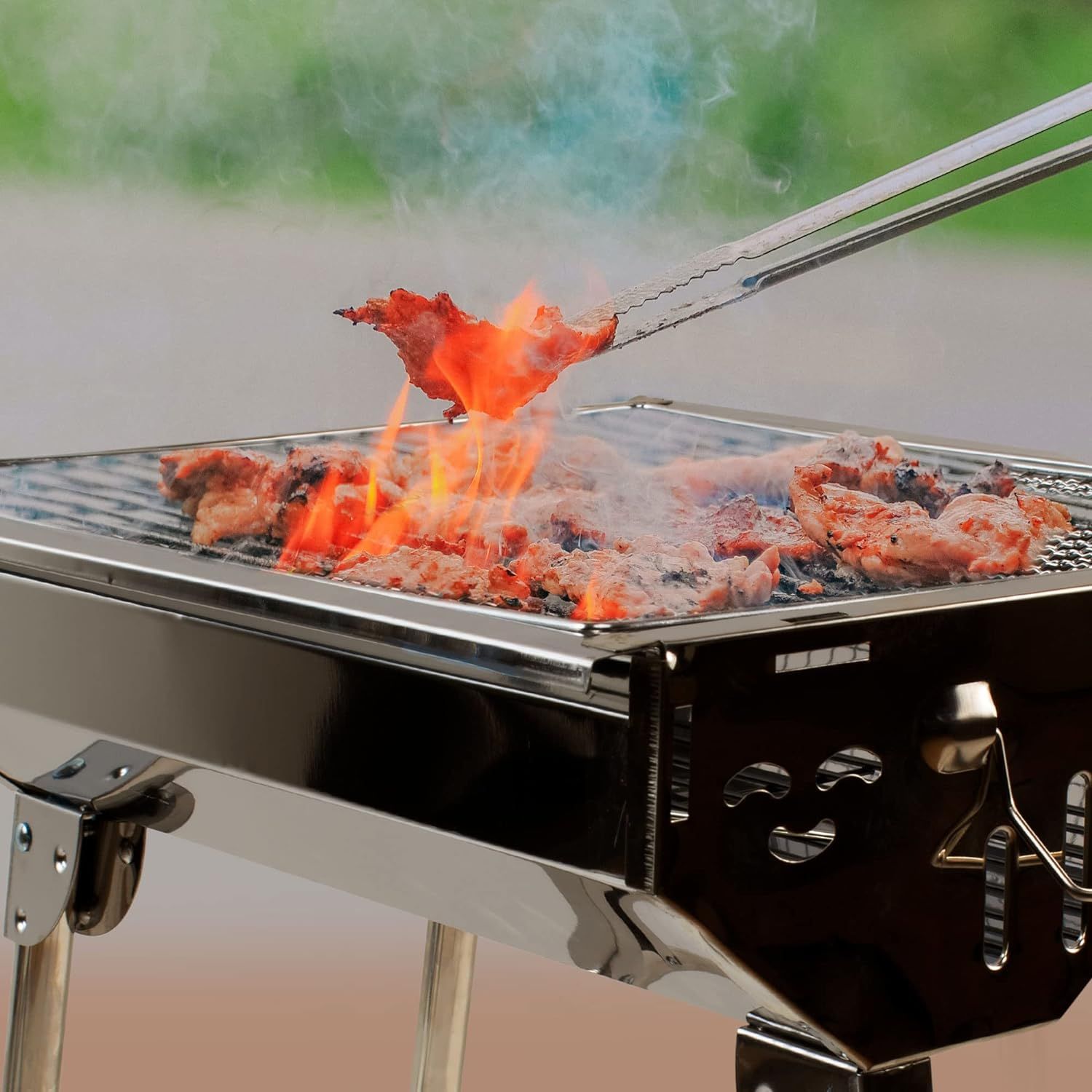 Średni grill węglowy ze składanymi nogami