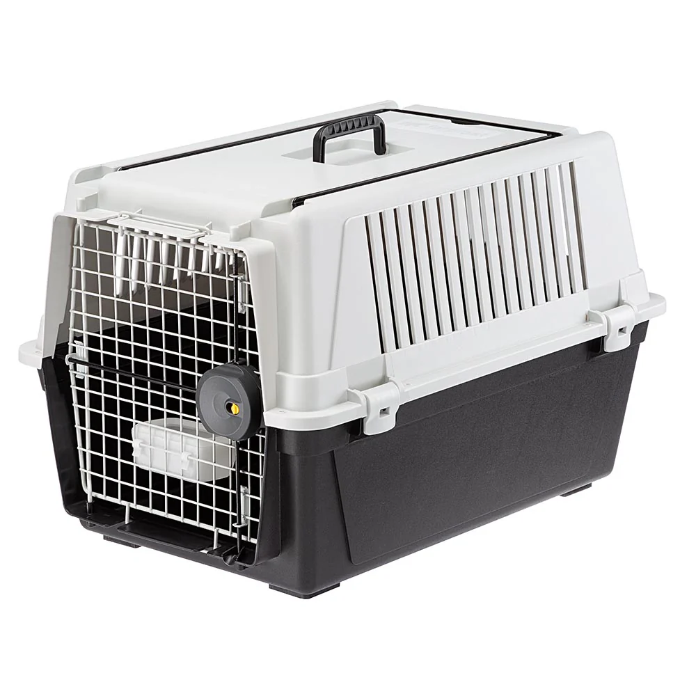 2025 Atlas 40 transportbox voor middelgrote honden �C veilig, geventileerd en IATA-conform. Met praktische handgreep, voederbak en optionele accessoires