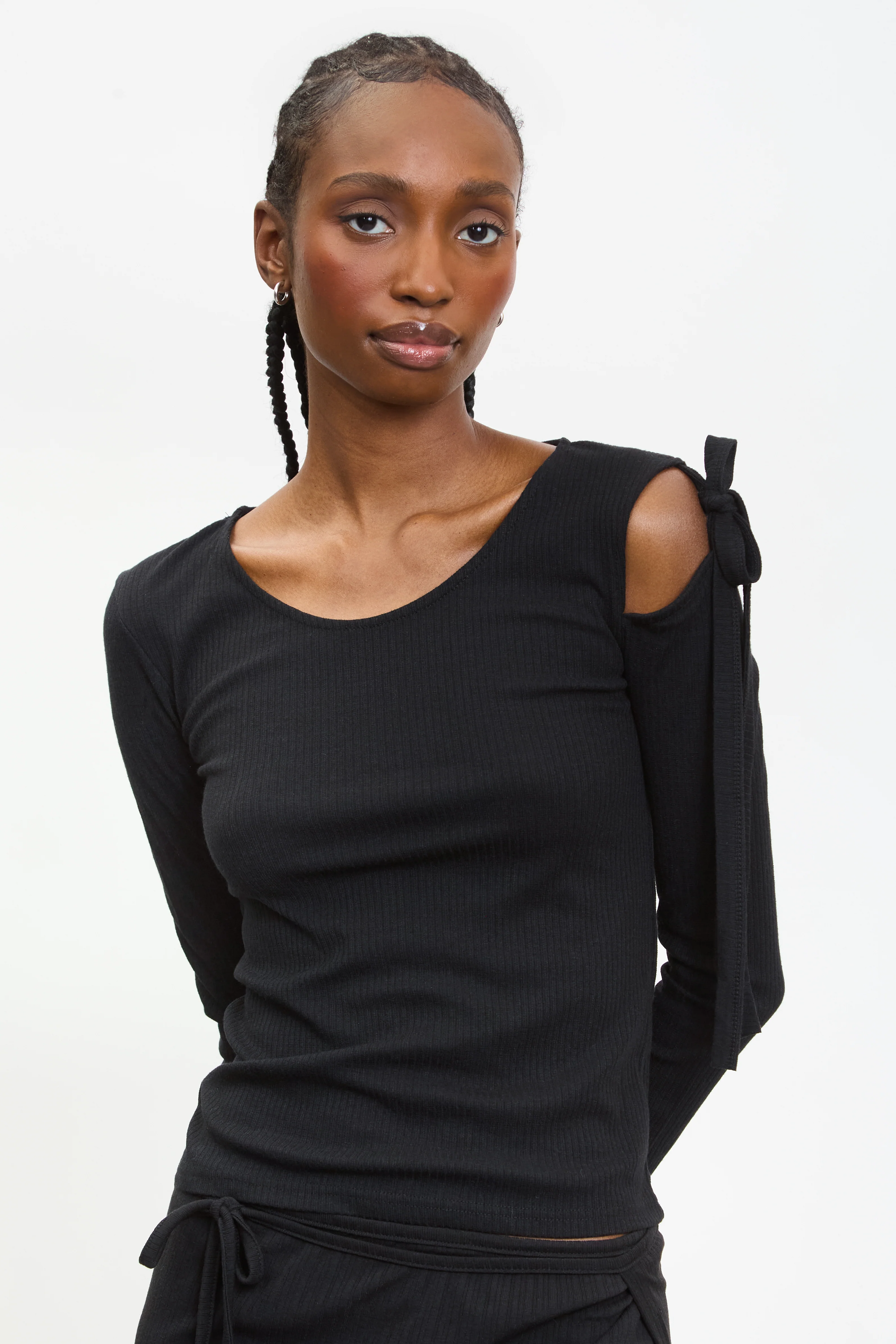 Black peek shoulder long sleeve top