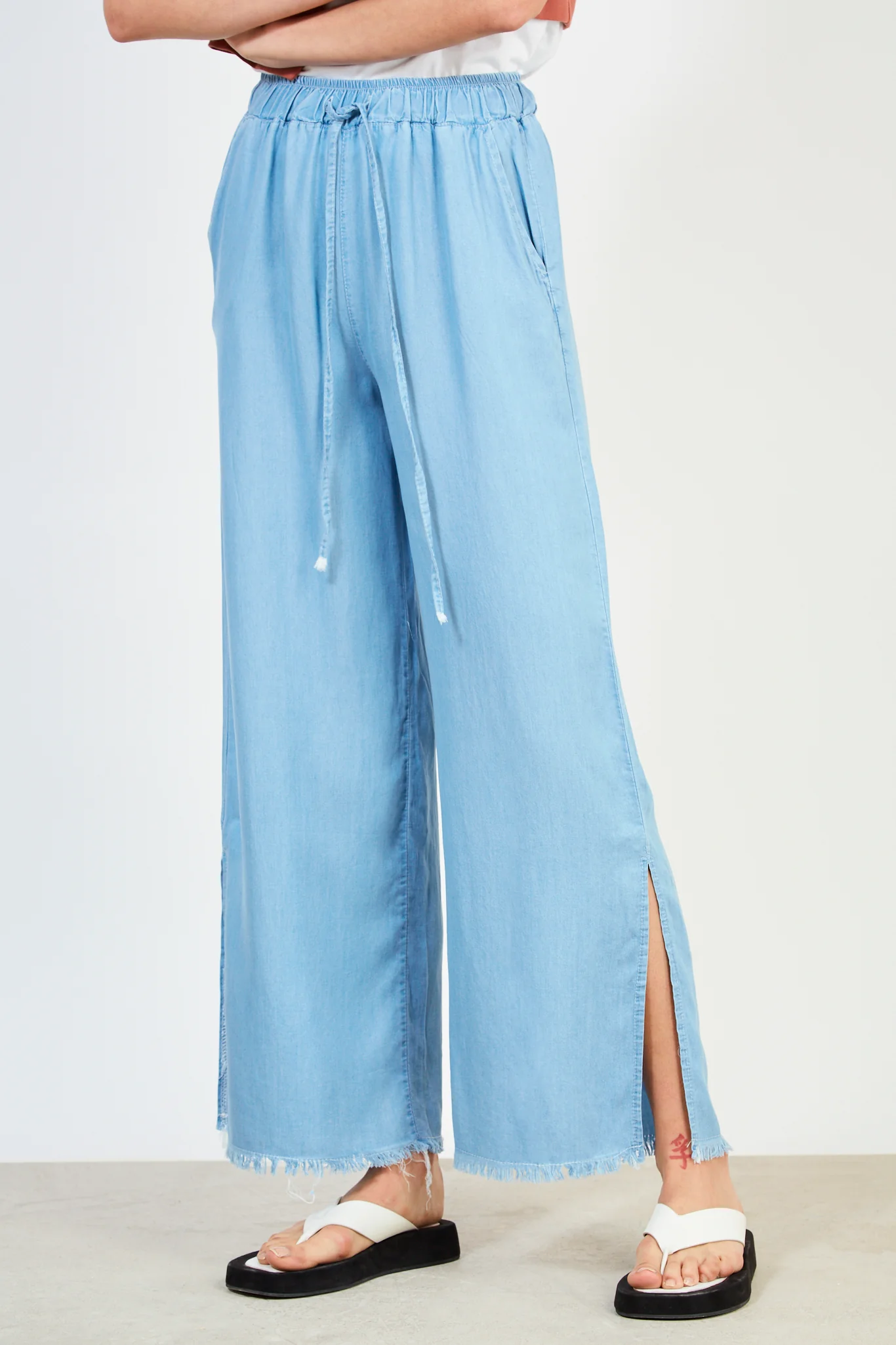 Light blue denim frayed hem wide leg trousers