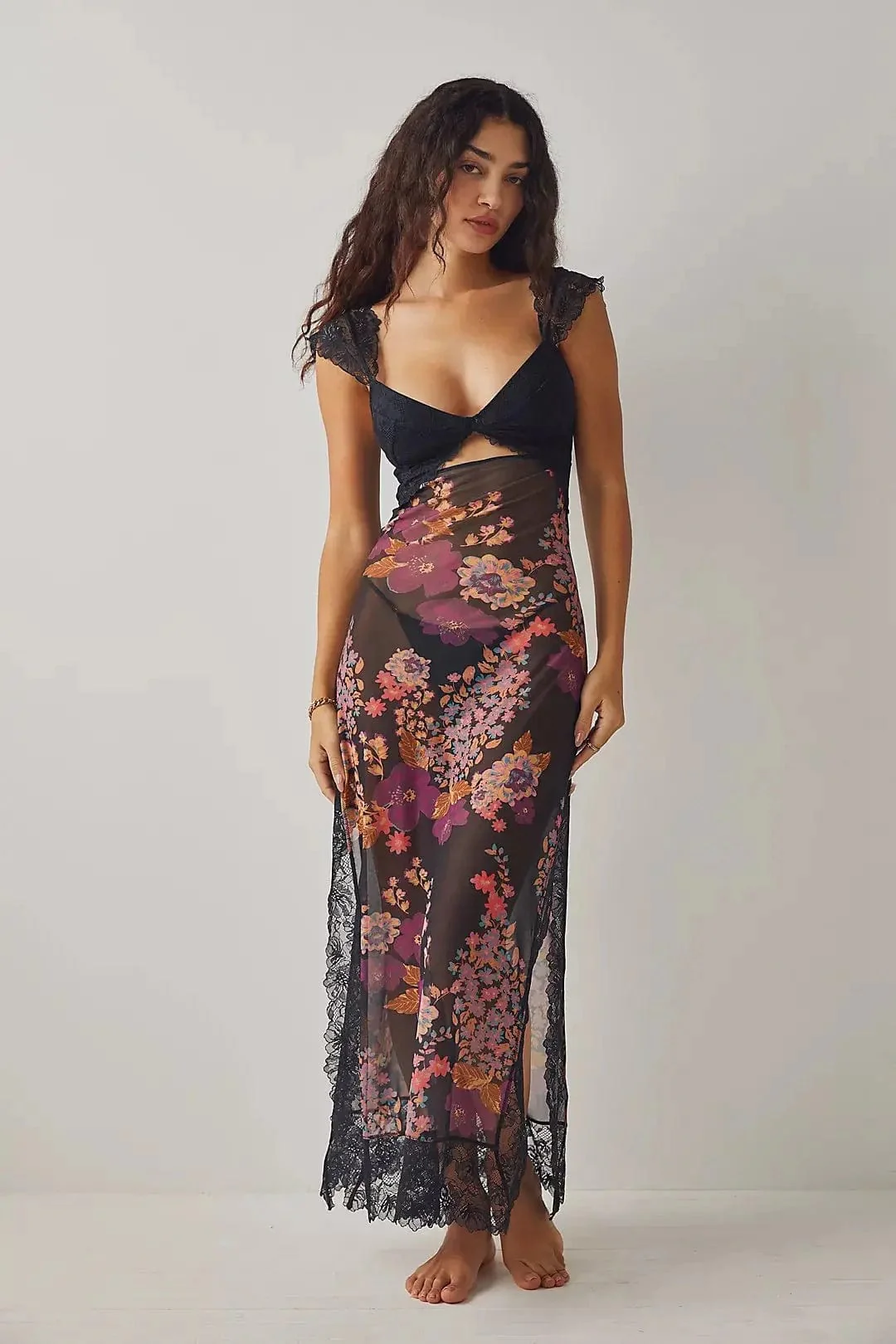 Robe midi ��lise fluide avec d��coupes et volants