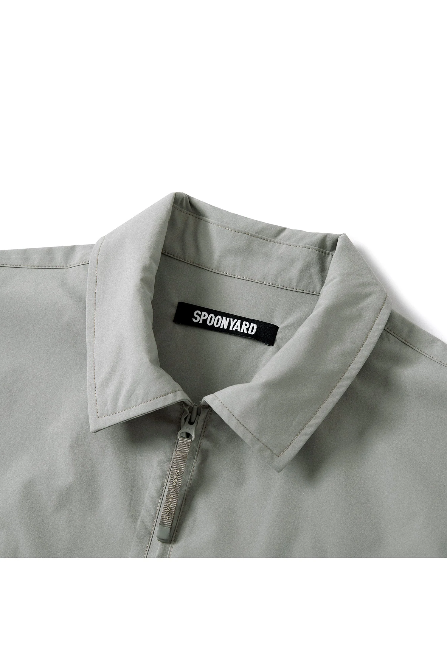 UNISEX SOLOTEX® PACKABLE HALF ZIP POLO