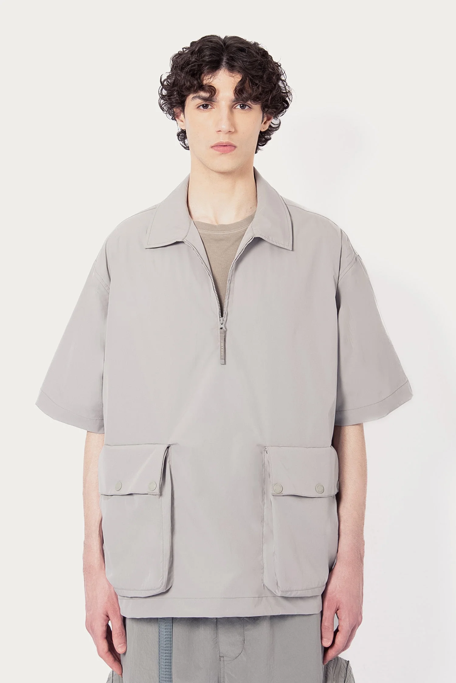 UNISEX SOLOTEX® PACKABLE HALF ZIP POLO