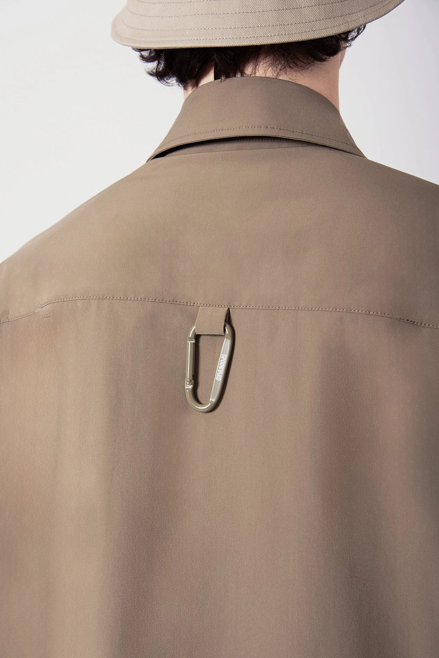 UNISEX SOLOTEX® PACKABLE HALF ZIP POLO