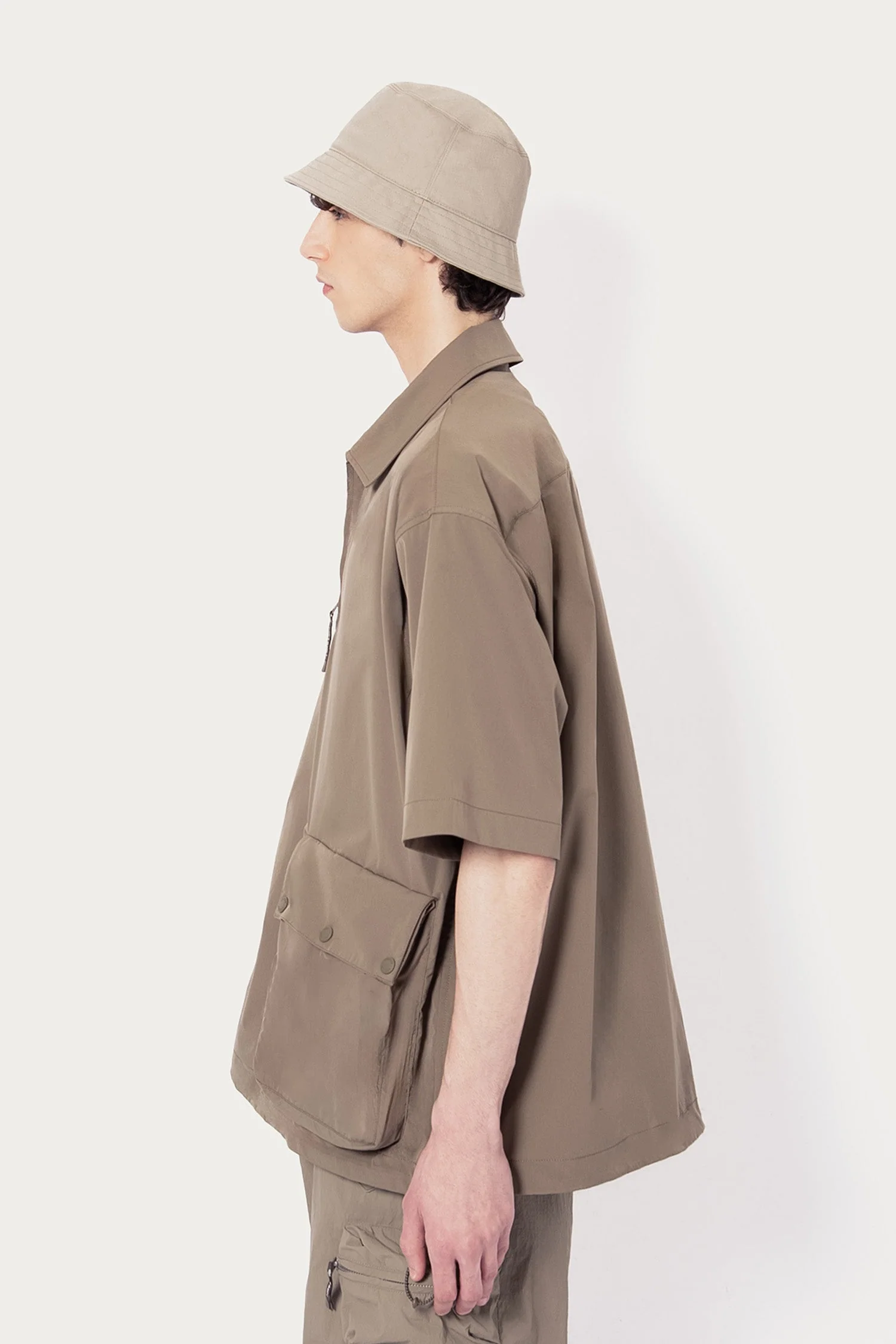 UNISEX SOLOTEX® PACKABLE HALF ZIP POLO