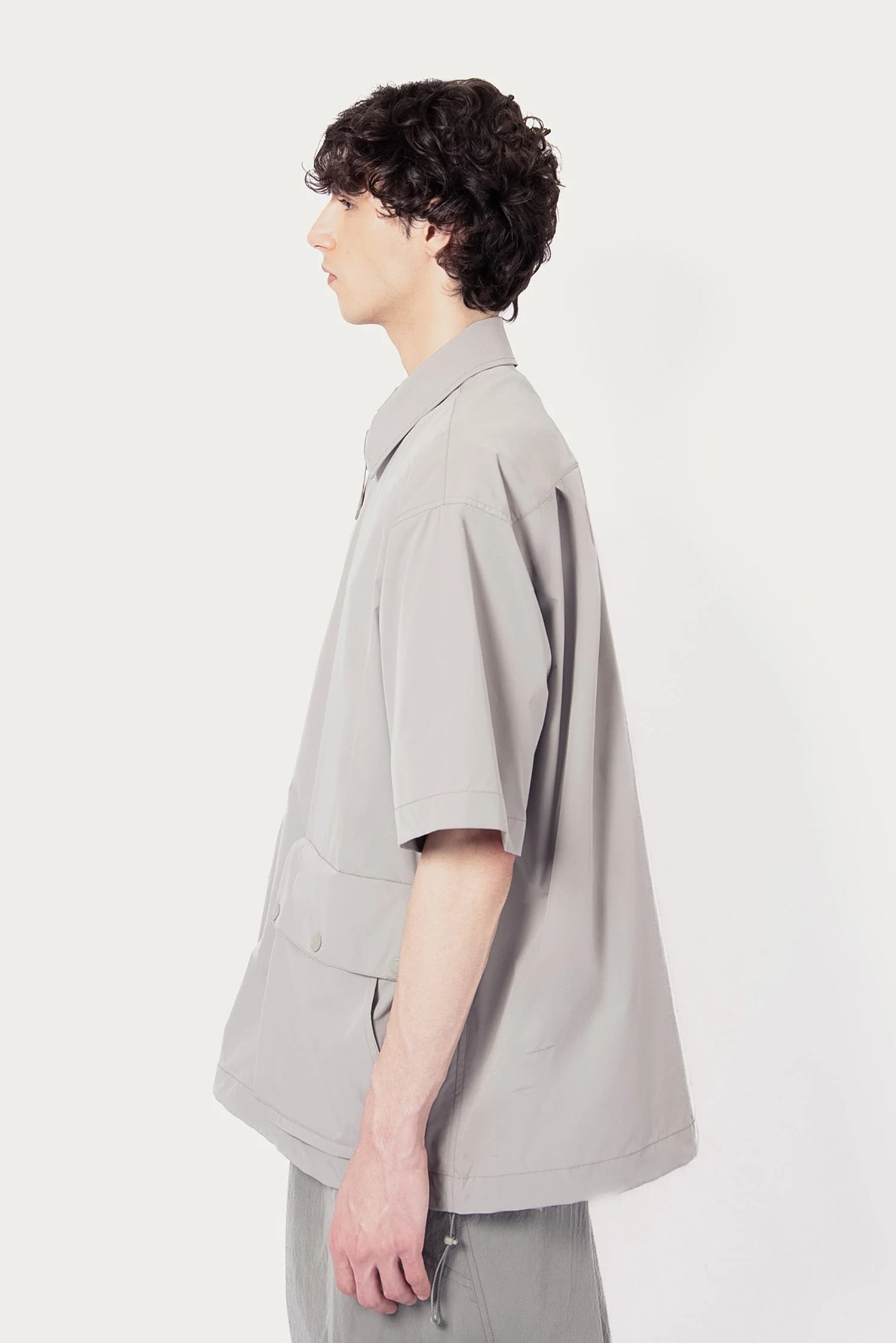 UNISEX SOLOTEX® PACKABLE HALF ZIP POLO